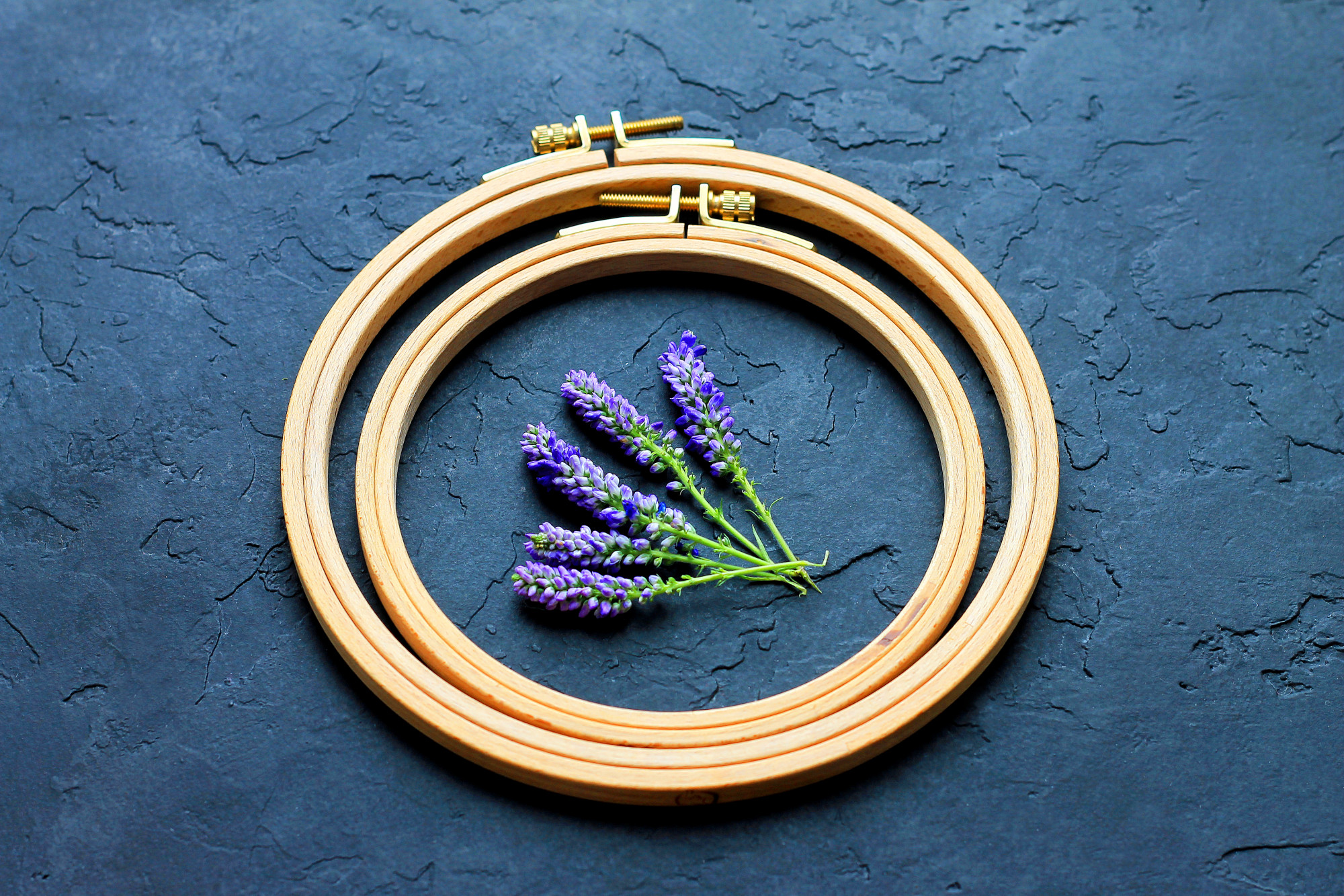 small hoop art with gold thread accents